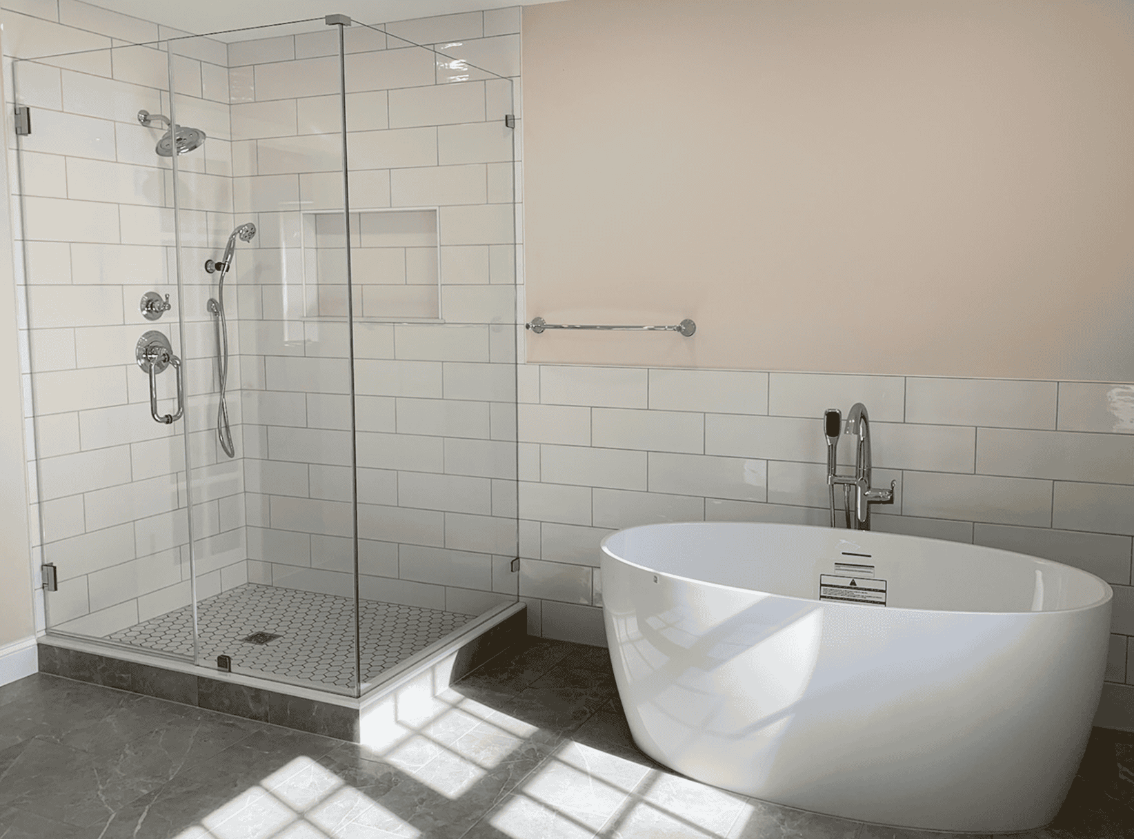 Contemporary bathroom with walk-in shower and freestanding tub for luxury comfort.